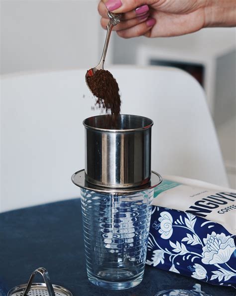 To make coffee with a single-serving <b>phin</b>, you put the device over a mug, and add about two tablespoons of coffee grounds to it. . Phin s